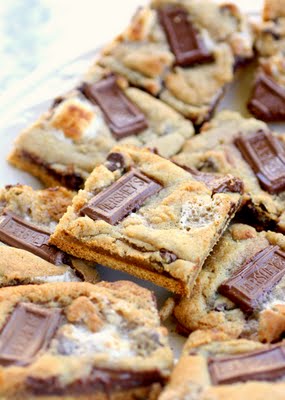 S'mores Cookies - graham crackers topped with chocolate chip marshmallow cookie dough and topped with Hershey squares. the-girl-who-ate-everything.com