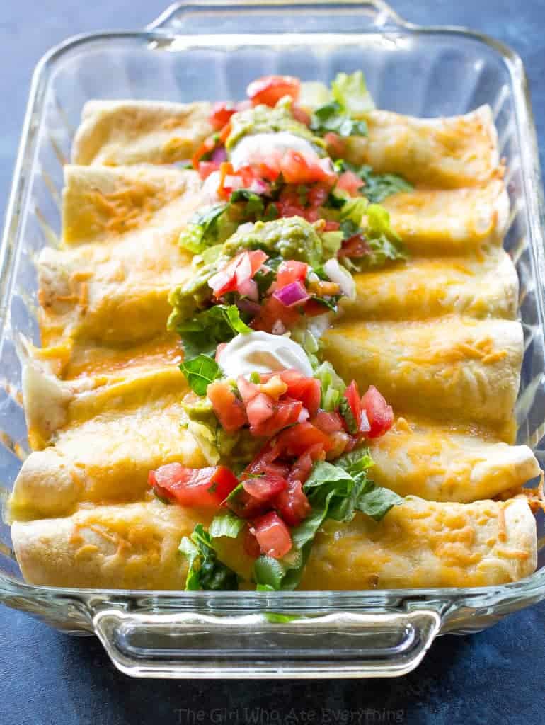 Honey Lime Chicken Enchiladas - my go-to easy Mexican dinner for company that is freezer friendly. the-girl-who-ate-everything.com