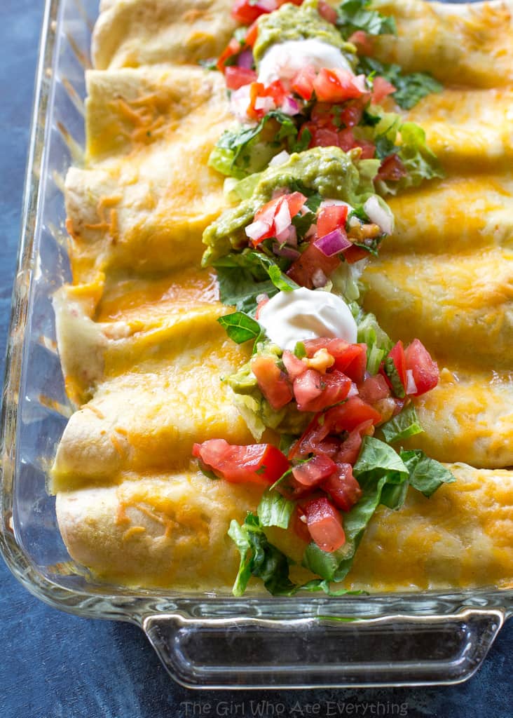 Honey Lime Chicken Enchiladas - my go-to easy Mexican dinner for company that is freezer friendly. the-girl-who-ate-everything.com