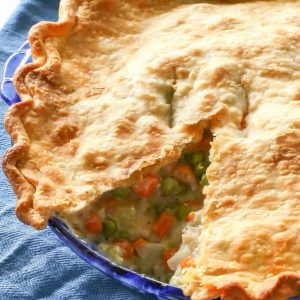 Chicken Pot Pie - a classic chicken pot pie with vegetables that is so comforting. My family loves this recipe. the-girl-who-ate-everything.com