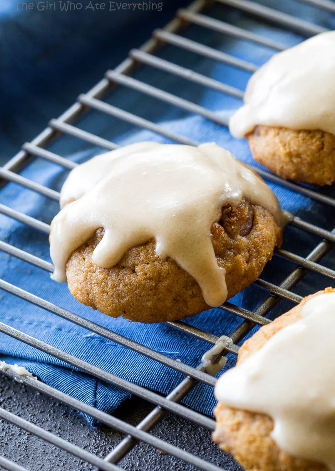 Pumpkin Chocolate Chip Cookies with Brown Sugar Icing - these soft pumpkin cookies will be a fall favorite every year. the-girl-who-ate-everything.com