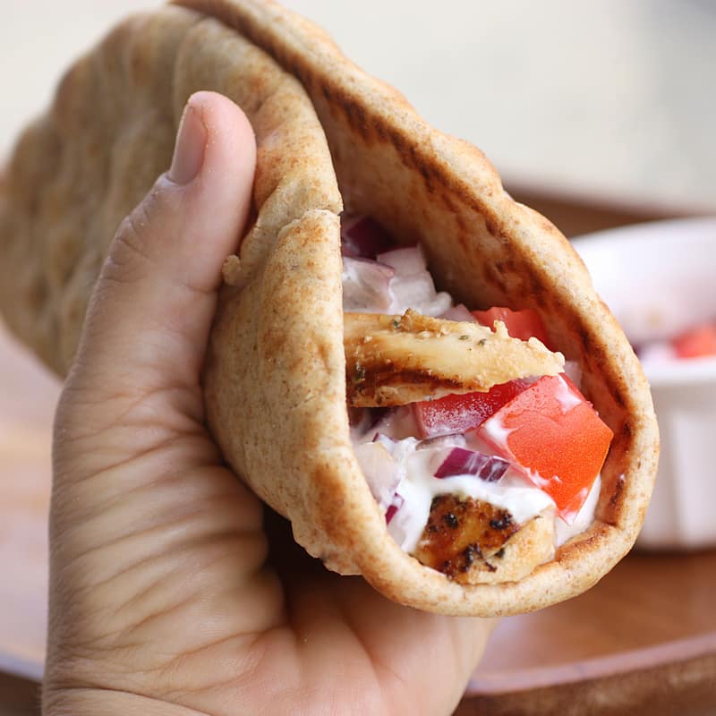 Chicken Gyros - Greek marinated chicken topped with fresh tzatziki sauce. the-girl-who-ate-everything.com