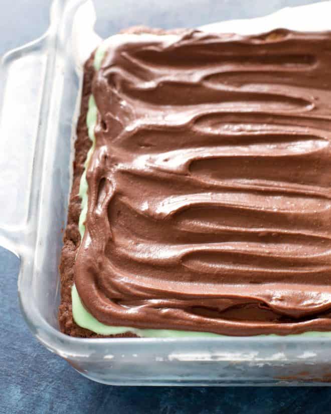 chocolate frosting on top of green frosting
