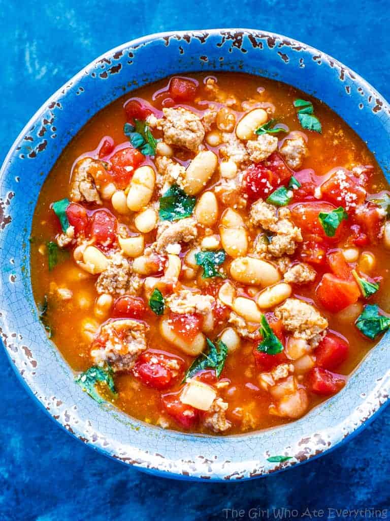 This White Bean and Sausage Soup is from my friend Steph only has six ingredients and has spicy sausage, basil, tomatoes, and beans!