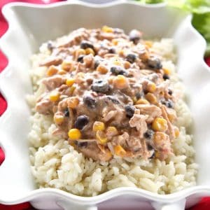 Slow Cooker Fiesta Chicken - an easy meal with chicken, cream cheese, black beans, and corn. the-girl-who-ate-everything.com