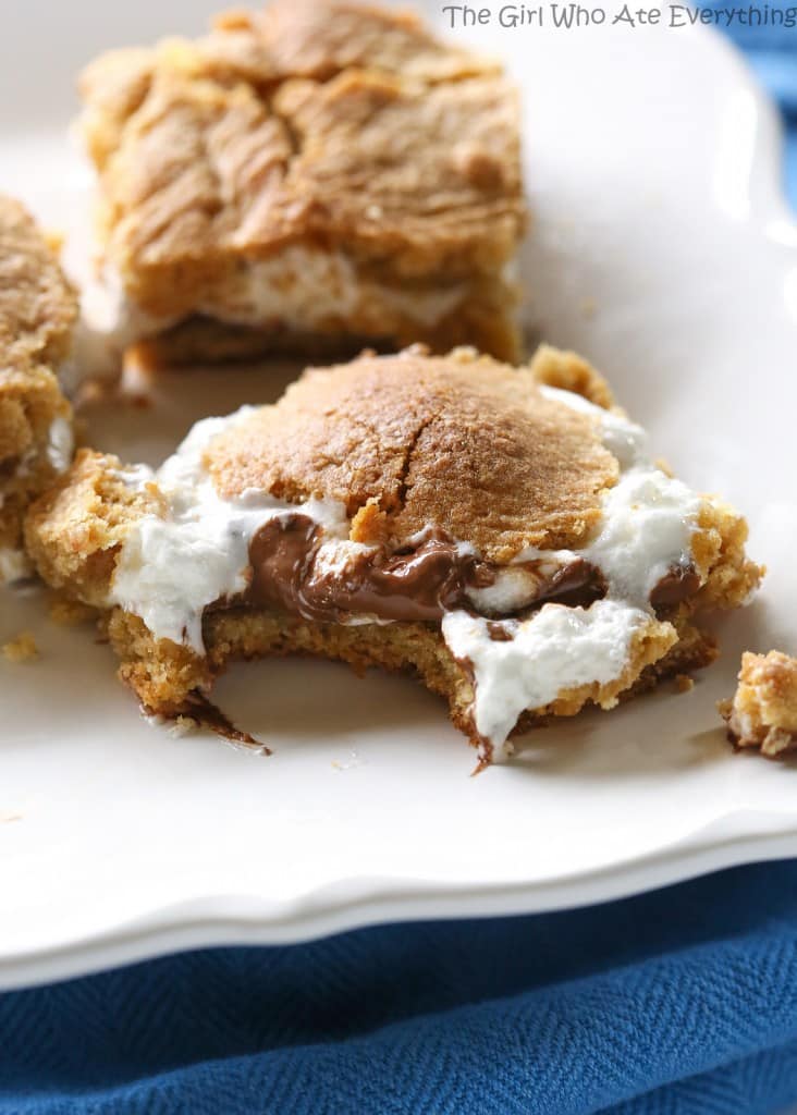 S'mores Bars - layers of graham cracker dough, marshmallow, and gooey chocolate. the-girl-who-ate-everything.com