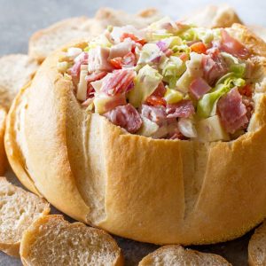 This Hoagie Dip recipe tastes just like a sub sandwich from Subway but in dip form. This appetizer should really be called Hoagie Spread because the best way to eat it is to spoon it on top of slices of bread.