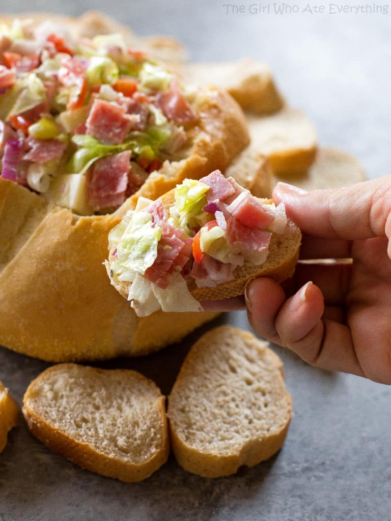 This Hoagie Dip recipe tastes just like a sub sandwich from Subway but in dip form. This appetizer should really be called Hoagie Spread because the best way to eat it is to spoon it on top of slices of bread.