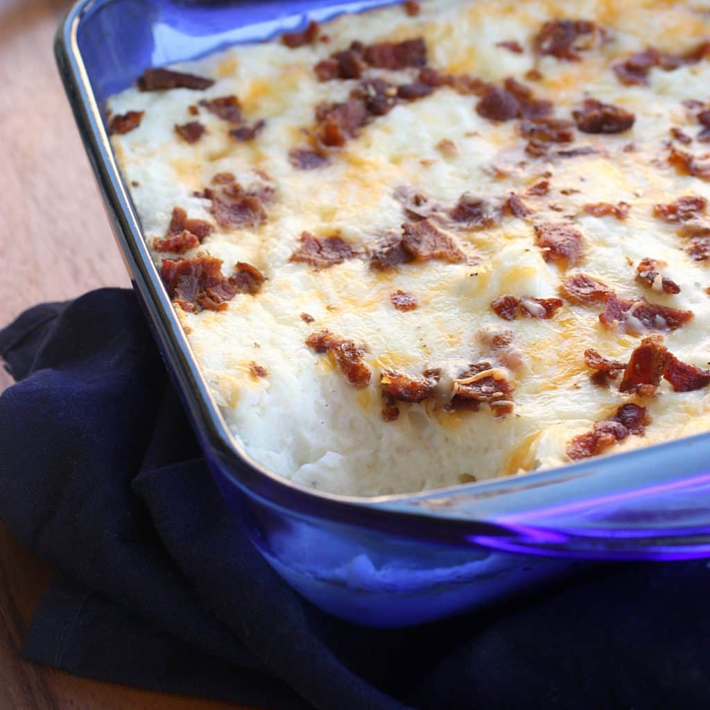 Loaded Baked Potato Casserole - creamy and full of everything you would find in a baked potato. the-girl-who-ate-everything.com