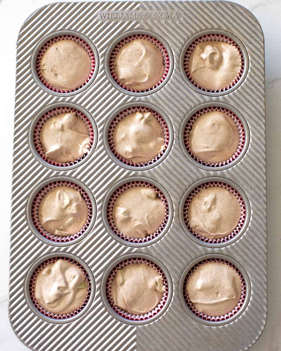 cupcake batter in muffin tin