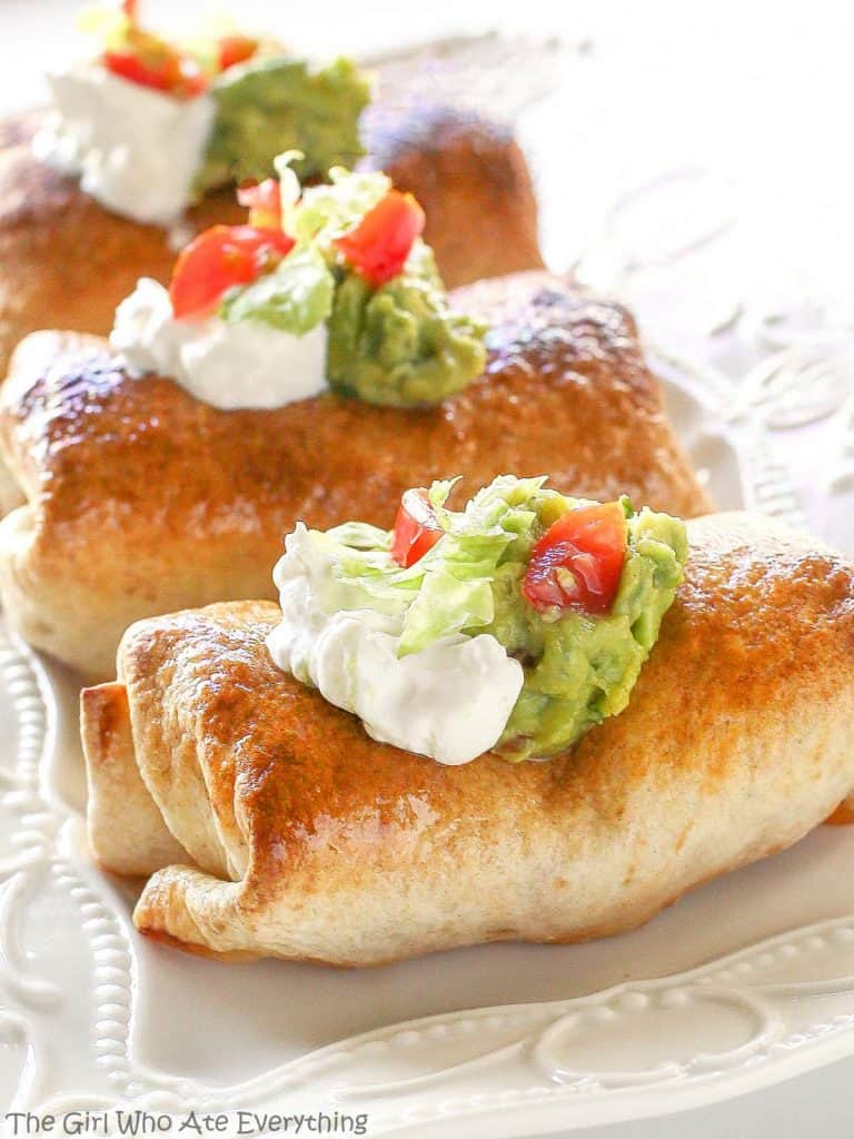 Baked Chicken Chimichangas on a white platter