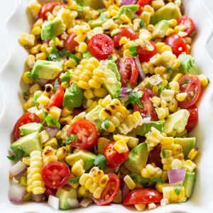 Corn, Avocado, and Tomato Salad - a healthy and light salad perfect for BBQs and get togethers. the-girl-who-ate-everything.com