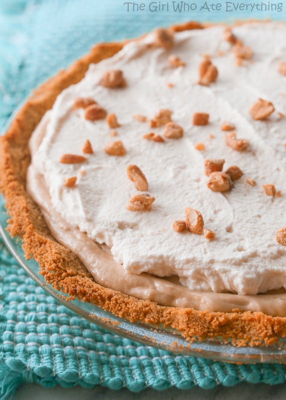 This Peanut Butter Pie recipe has a rich peanut butter flavor with honey roasted nuts and a graham cracker crust. the-girl-who-ate-everything.com