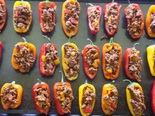 Mini Taco Stuffed Peppers - mini bell peppers stuffed with taco meat and drizzled with a cilantro cream sauce. {The Girl Who Ate Everything}