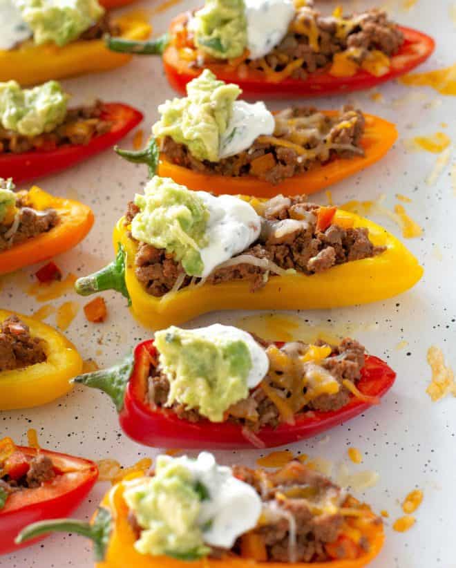 mini stuffed peppers with sour cream and guacamole