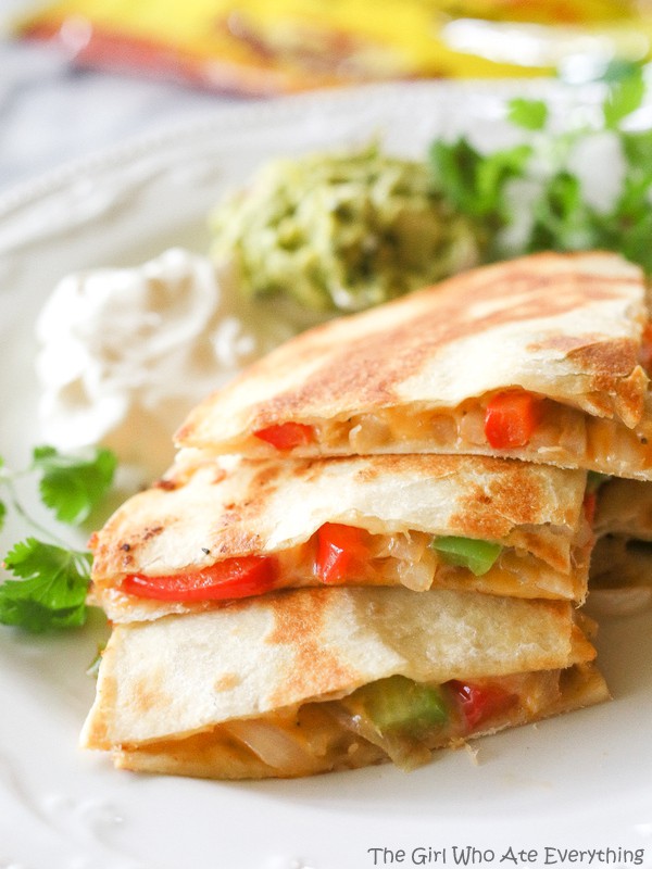 Fajita Quesadillas - Tortillas are filled with seasoned veggies and lots of cheese. A quick dinner for any night of the week. {The Girl Who Ate Everything}