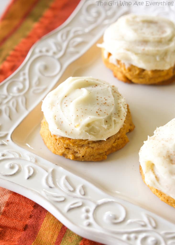 Melt In Your Mouth Pumpkin Cookies - super soft pumpkin cookies with cream cheese frosting. the-girl-who-ate-everything.com