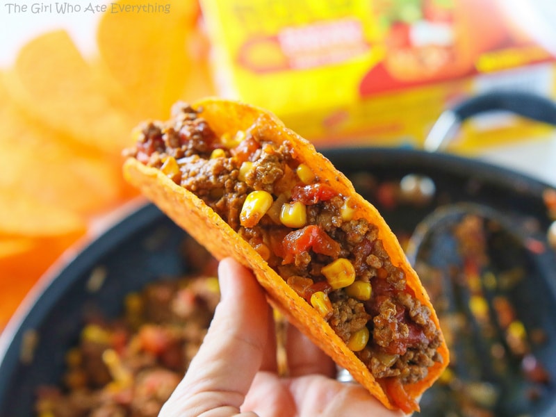 These Texas Tacos are a Tex-Mex twist on your classic taco. It’s filled with taco meat, bell peppers, onions, diced tomatoes, and corn. the-girl-who-ate-everything.com