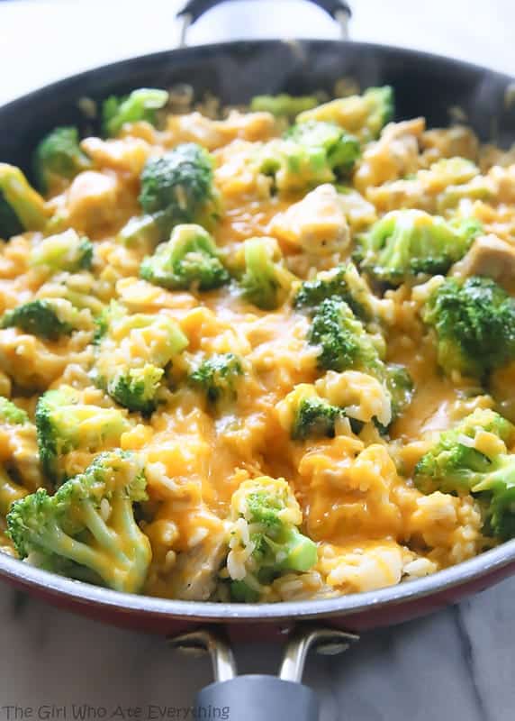 One-Pan Cheesy Chicken, Broccoli, and Rice in a black skillet