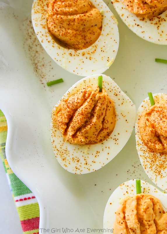 Roasted Red Pepper Deviled Eggs - naturally orange colored pumpkin shaped deviled eggs. the-girl-who-ate-everything.com