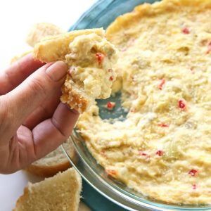 Warm Feta Dip With Artichokes - an easy and crowd pleasing appetizer with feta, artichokes, and pimentos.