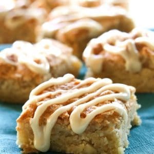 Nutty Eggnog Bars - Super chewy bars with Macadamia nuts that are drizzled with an eggnog glaze. the-girl-who-ate-everything.com