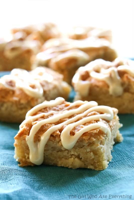 Nutty Eggnog Bars - Super chewy bars with macadamia nuts that are drizzled with an eggnog glaze. the-girl-who-ate-everything.com