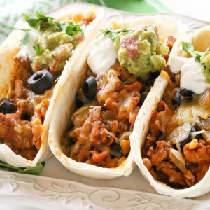 These Green Chile Turkey Tacos are packed with flavor and so easy. Green chilies and olives are added to the meat mixture. Even non-turkey lovers won’t complain about these tasty tacos. the-girl-who-ate-everything.com