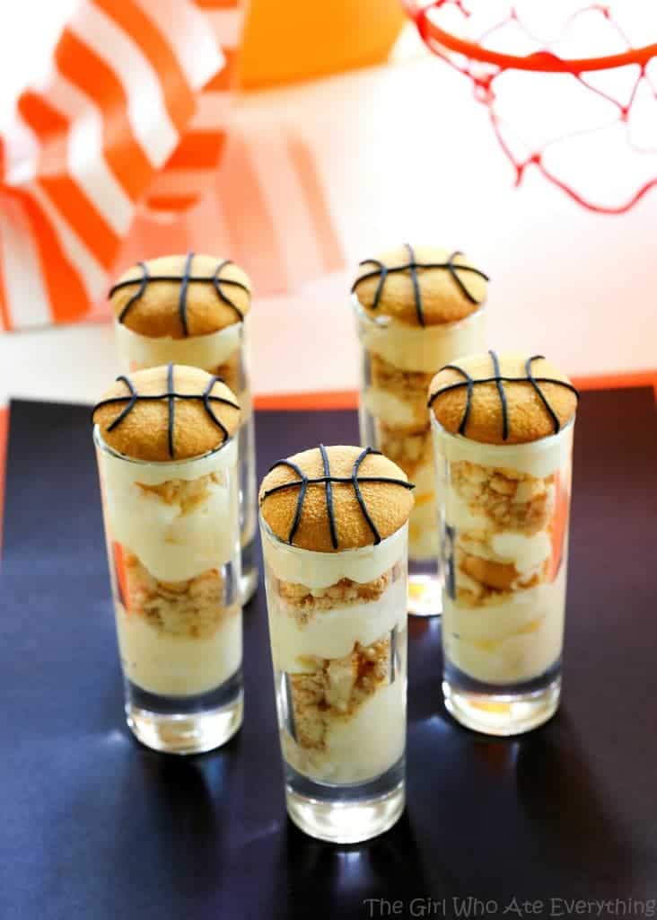 Cheesecake Pudding Shooters - layers of cheesecake pudding and crushed up Nilla wafers make for some easy March Madness treats. www.the-girl-who-ate-everything.com