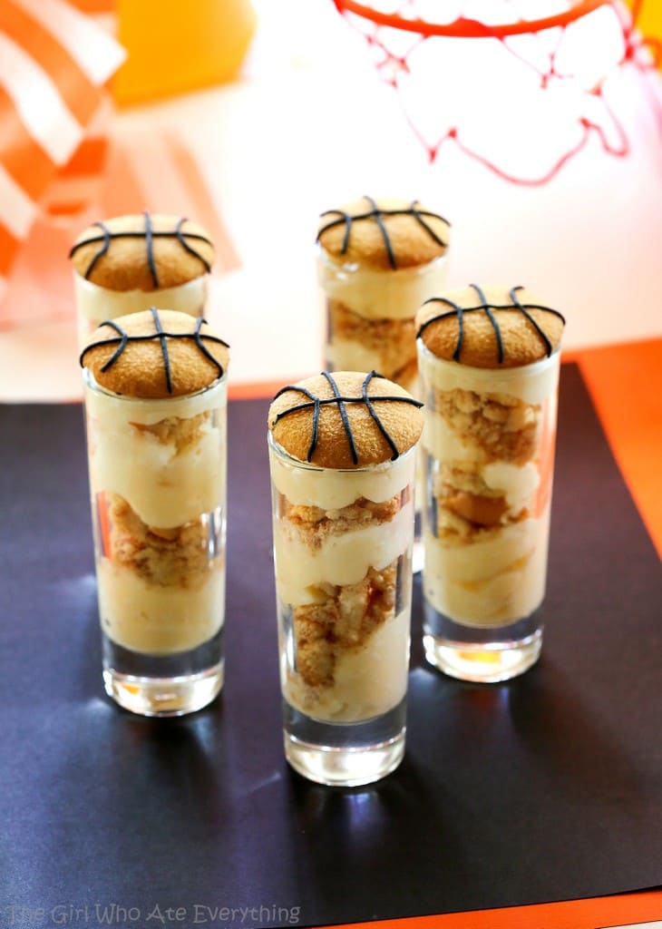 Cheesecake Pudding Shooters - layers of cheesecake pudding and crushed up Nilla wafers make for some easy March Madness treats. www.the-girl-who-ate-everything.com