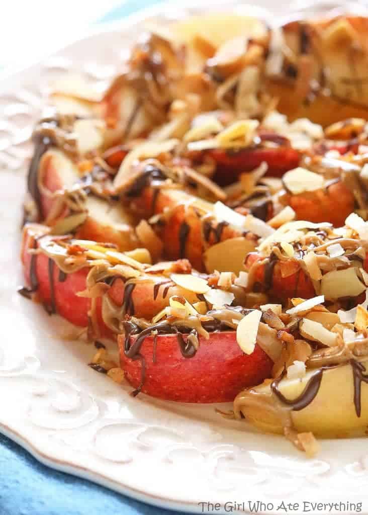 Chocolate Peanut Butter Apples with Coconut and Almonds - believe it or not this is healthy! Only 156 calories...
