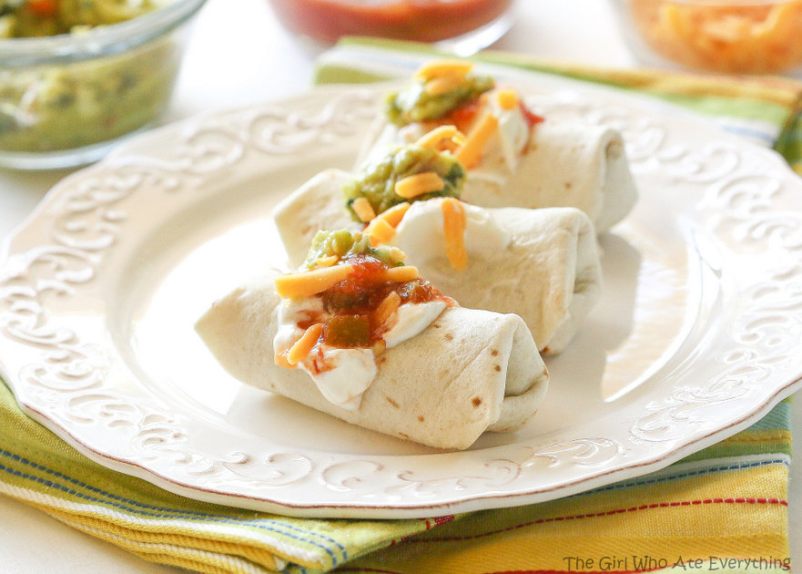 These Mini Burritos are filled with seasoned meat, beans, and cheese. Serve them as an appetizer and let your guests top their own. #burritos #mexican #appetizer