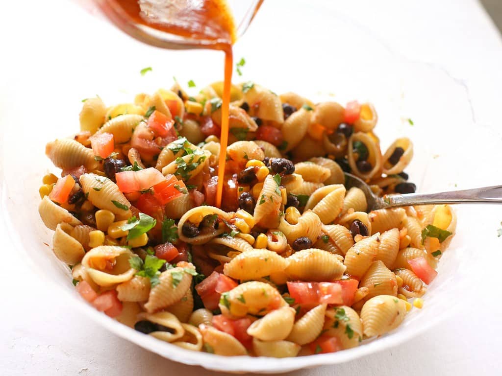 Taco Pasta Salad - black beans, corn, cilantro, and tomatoes. the-girl-who-ate-everything.com