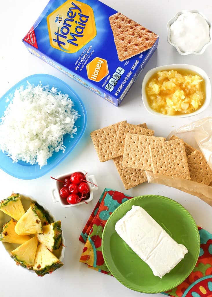 Pina Colada Dip - creamy dip with a tropical twist. Dip fruit or graham crackers in it. Great for a lunch box or after school snack. the-girl-who-ate-everything.com