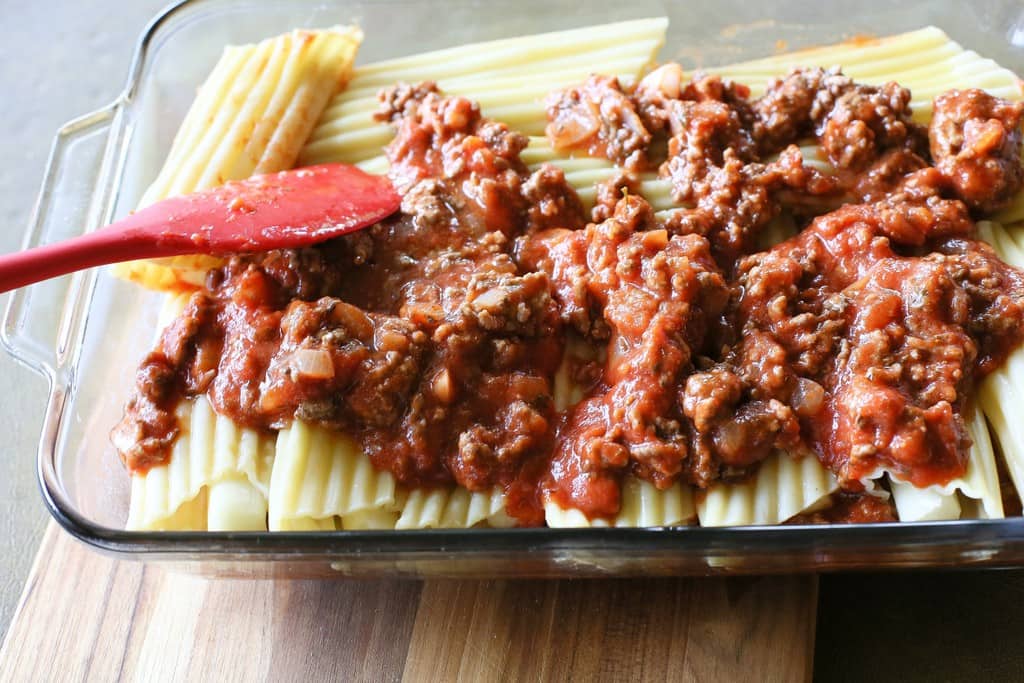 String Cheese Manicotti - Easy to stuff manicotti by using string cheese. Weeknight meals don't get easier than this. the-girl-who-ate-everything.com
