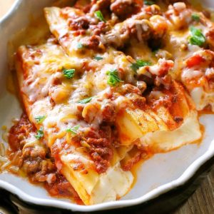 String Cheese Manicotti - Easy to stuff manicotti by using string cheese. Weeknight meals don't get easier than this. the-girl-who-ate-everything.com