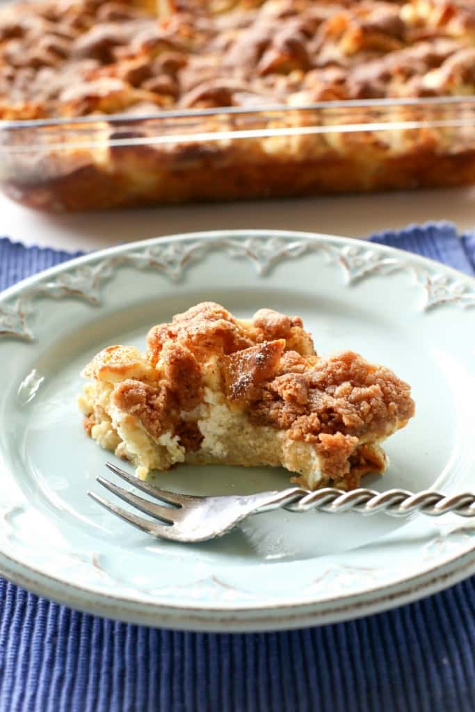 Cream Cheese Cinnamon Casserole with a slice cut out