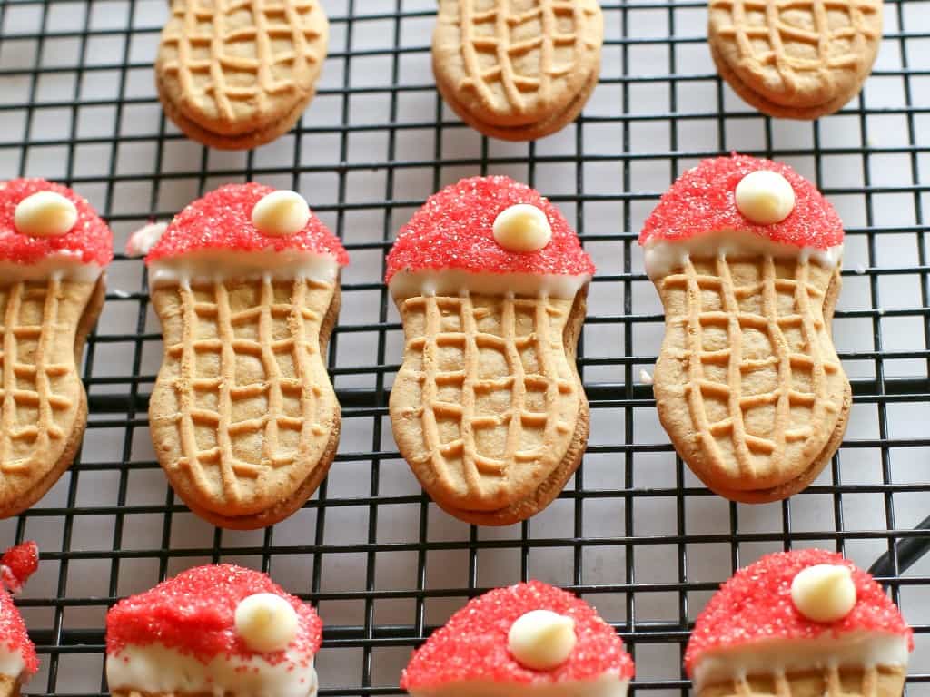 Santa Claus Cookies - easy Nutter Butter based cookies to make with your kids that are fancy enough to give to your friends. the-girl-who-ate-everything.com