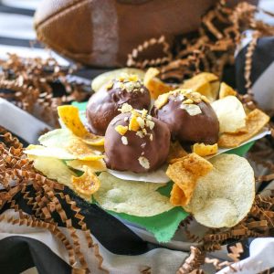 Loaded Peanut Butter Chip Balls - Fritos and Lays crushed up with peanut butter and dipped in chocolate. the-girl-who-ate-everything.com