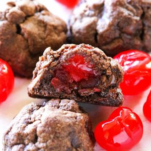 Nutella Cherry Cookies - only 5 ingredients and you have easy chocolate gooey cookies! the-girl-who-ate-everything.com