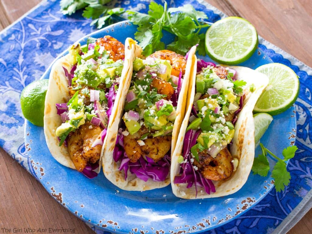 These Grilled Shrimp Tacos with Avocado Salsa are light and refreshing! the-girl-who-ate-everything.com