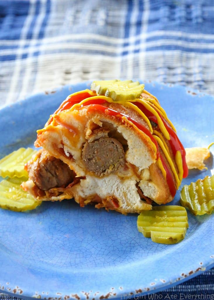 Bacon Cheeseburger Monkey Bread - layers of cheese, bacon, meatballs, and dough. the-girl-who-ate-everything.com