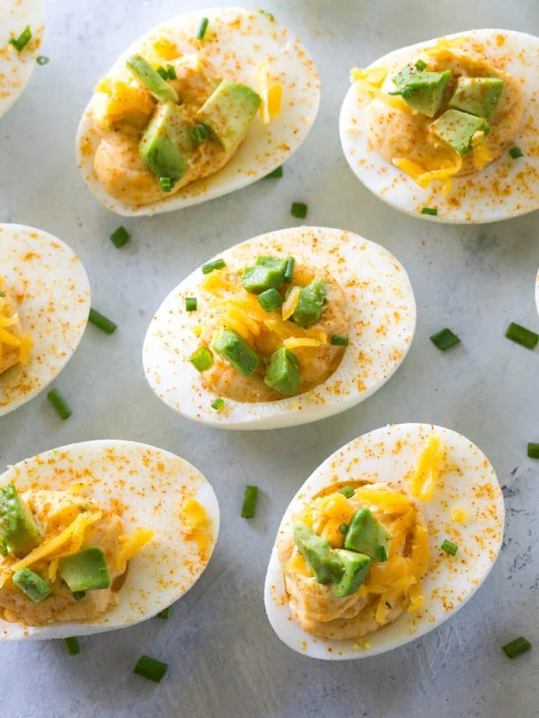 These Mexican Deviled Eggs are a spicy twist on your classic deviled eggs. the-girl-who-ate-everything.com
