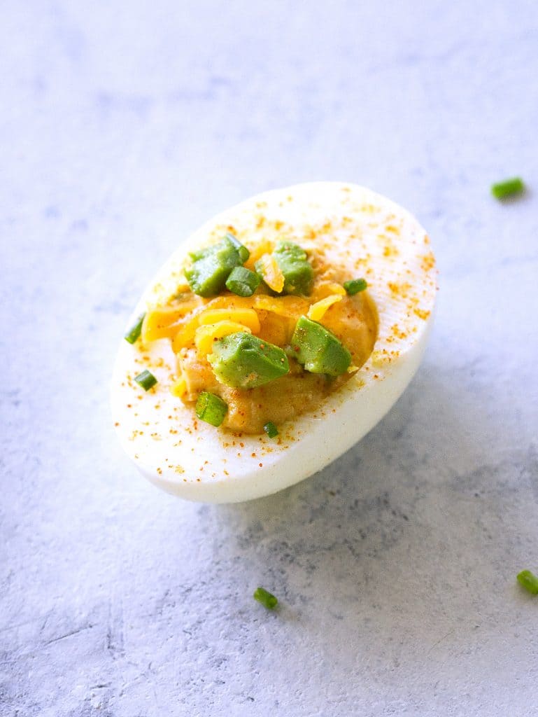 These Mexican Deviled Eggs are a spicy twist on your classic deviled eggs. the-girl-who-ate-everything.com