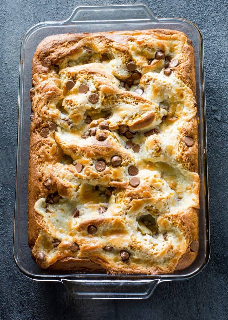 Pumpkin Earthquake Cake - a moist pumpkin cake with coconut, pecans, and swirled with a cream cheese mixture. You want to make this for fall! the-girl-who-ate-everything.com
