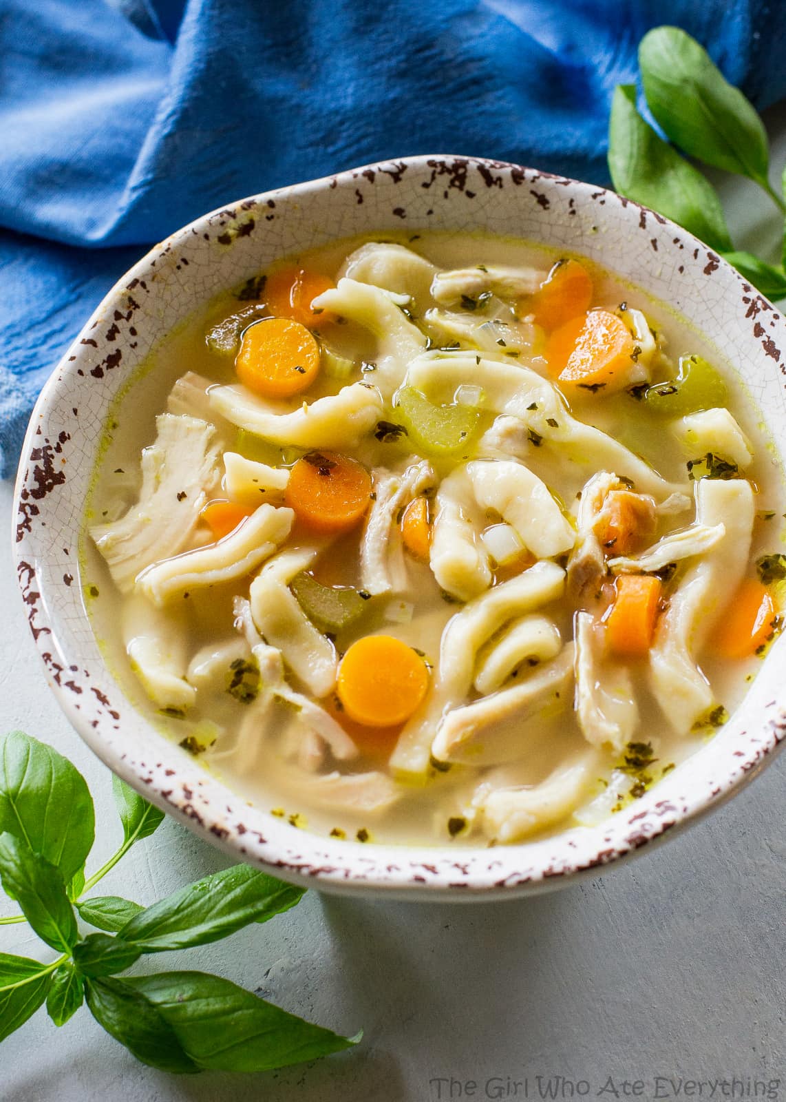 Homemade Chicken Noodle Soup - tried and true comfort food. A recipe for homemade noodles too but you can use store bought as well. the-girl-who-ate-everything.com