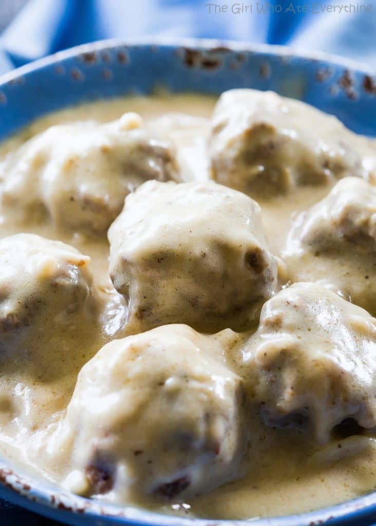 Swedish Meatballs - so tender with a flavorful gravy. Serve over noodles or rice. the-girl-who-ate-everything.com