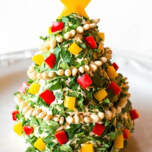 Christmas Cheese Tree - super simple yet impressive cheese ball shaped in a tree! the-girl-who-ate-everything.com