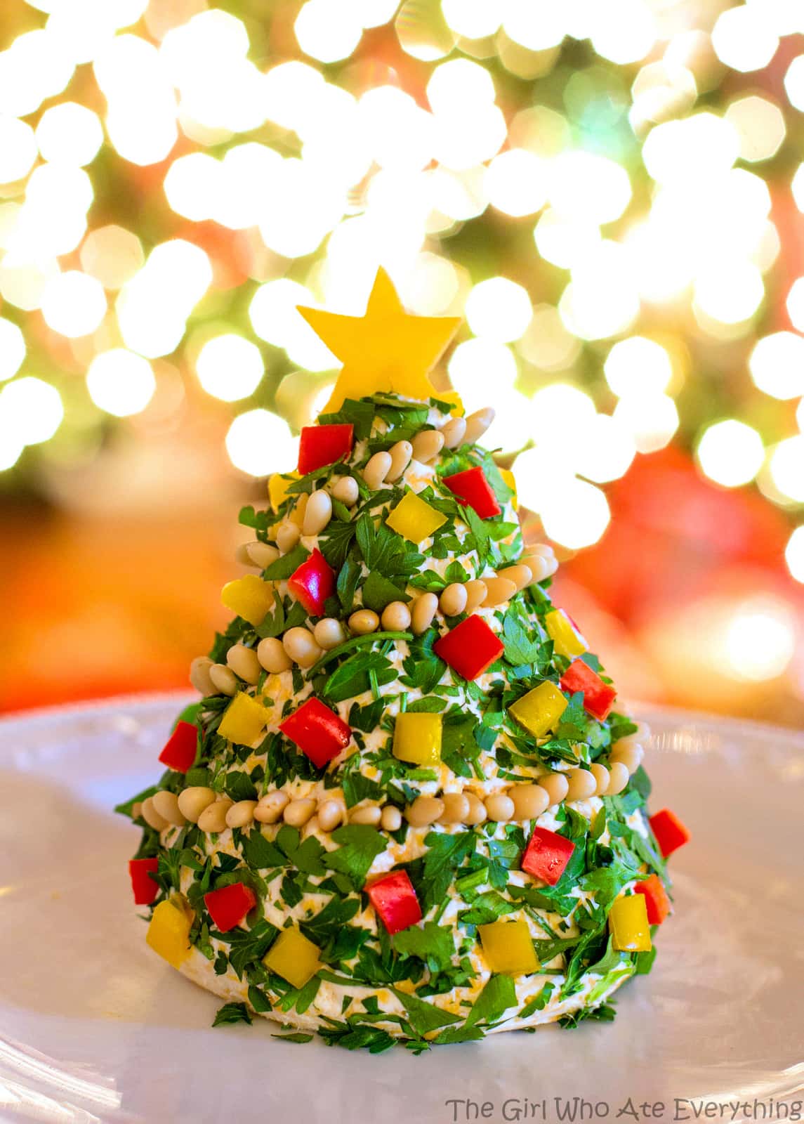 Christmas Cheese Tree - super simple yet impressive cheese ball shaped in a tree! the-girl-who-ate-everything.com