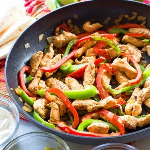 Classic Chicken Fajitas - full of flavor, easy, and just what you want when you're craving fajitas. the-girl-who-ate-everything.com